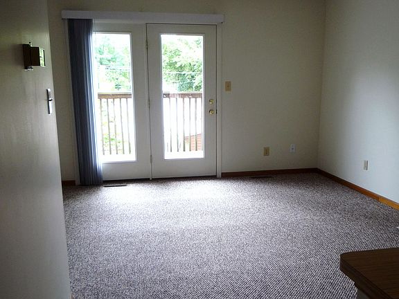 View from kitchen with bar into living room