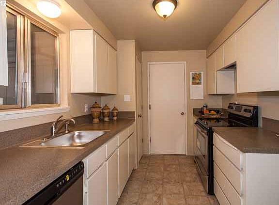 Kitchen with door to garage