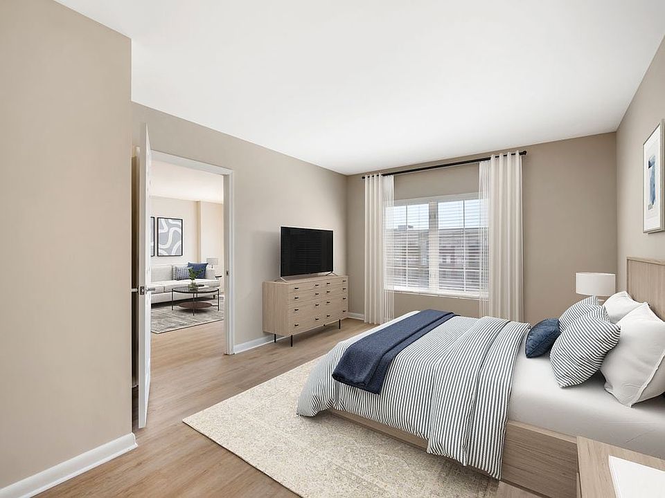 Signature Collection bedroom with hard surface flooring