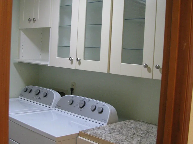 W/D included and incredible storage with shelves and drawers in laundry room