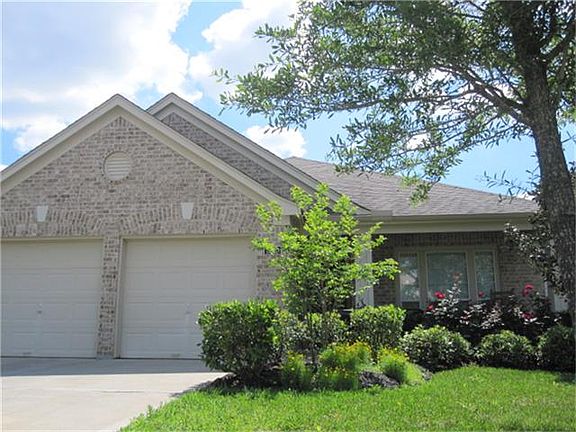 There is a 2 car attached garage that has a auto garage door opener.