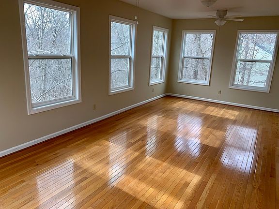 Large family living area with lot of windows keeps you close to nature.