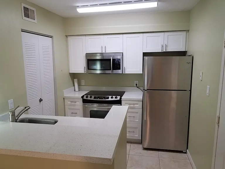 Extremely functional kitchen with island for eating or sharing moment with your guests while you prepare dinner.
