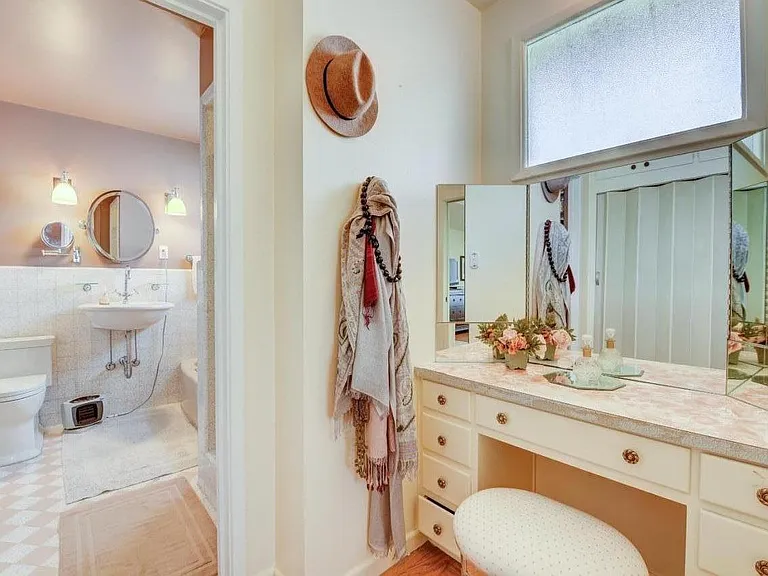 WALK IN CLOSET OF ROOM#1 WITH A LOCKABLE DOOR TO THE 2ND FLOOR BATH