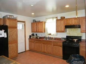 4th image of 10306 Farmers Blvd