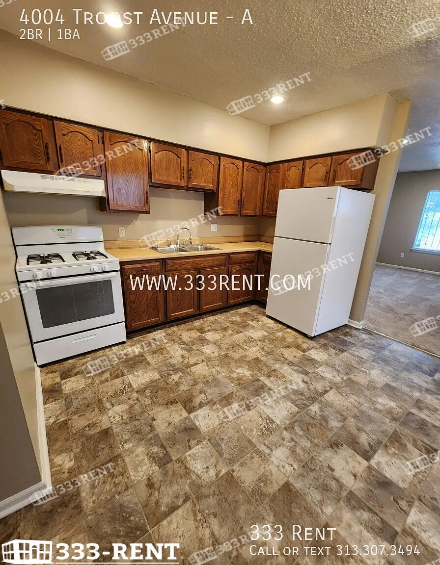 Large converted duplex close to UMKC & Rockhurst with old-world charm and stunning extras through... — Photo 3