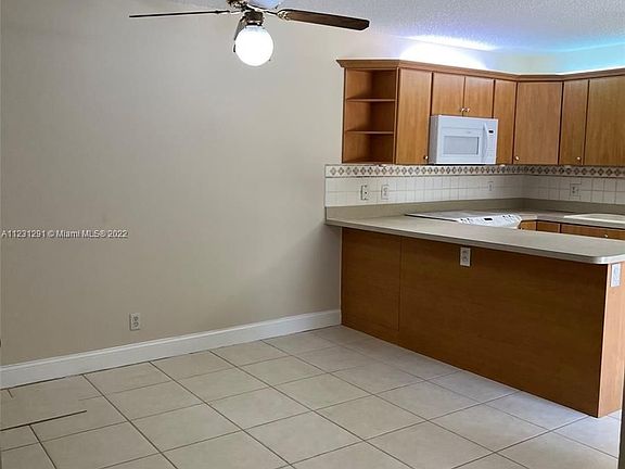 5th image of 9876 NW 6th Ct #9876