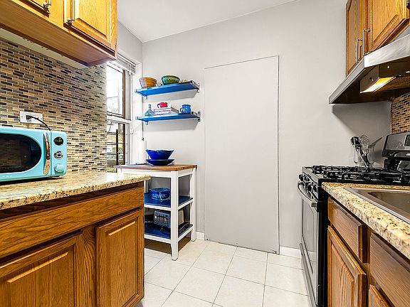 5th image of 67-38 108th St APT A15