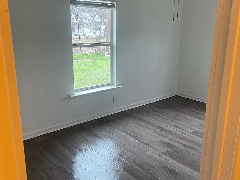 One of three bedrooms