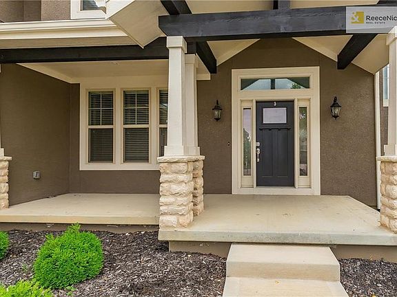 Large front porch perfect for relaxing.