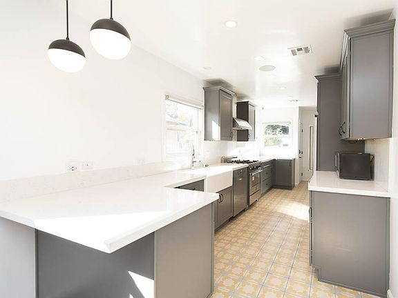 Kitchen with bar seating and tons of storage