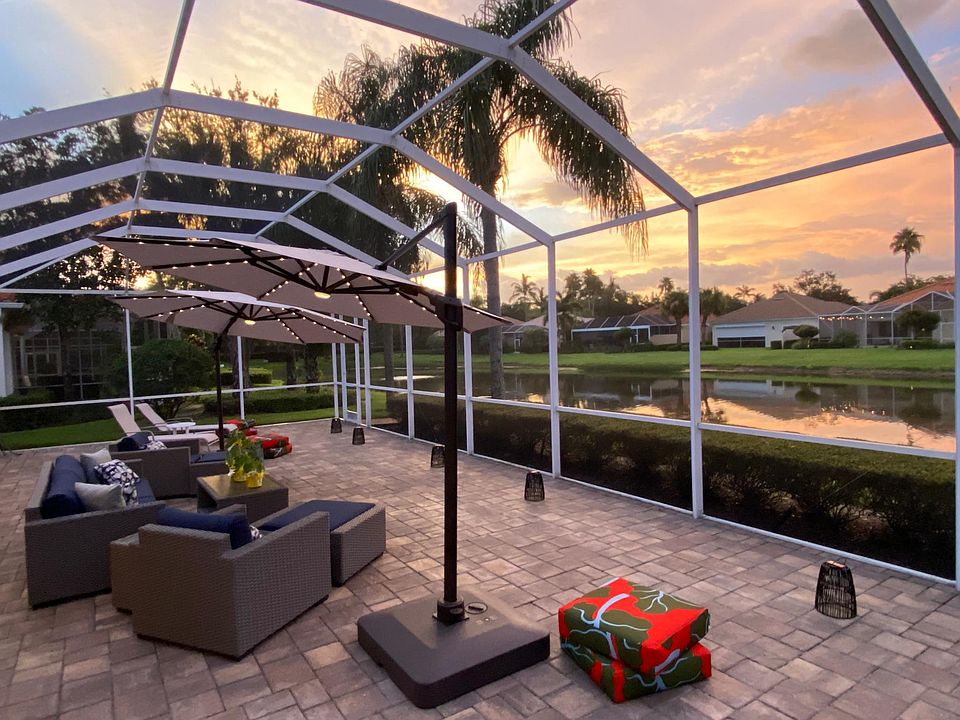 Screened-in lanai overseeing one of the 30 sparkling lakes