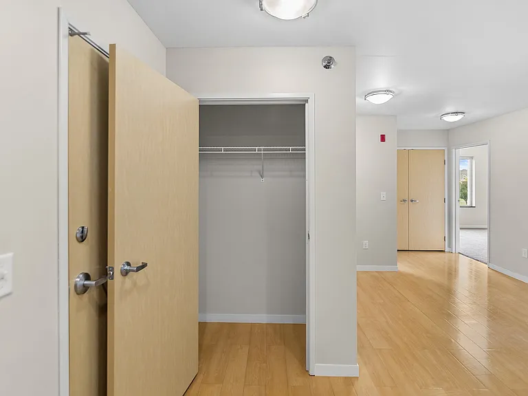 Uncover the spacious layouts and modern finishes of Overlook Ridge, where comfort meets style. This image showcases a well-appointed closet, enhancing your living experience. Envision your new home todayschedule a tour now!
