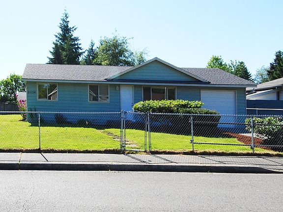 Oversized one-car garage with lots of additional parking.
