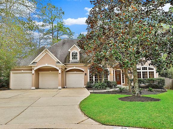 A daytime look at the stunning curb appeal and extra wide and generous driveway.