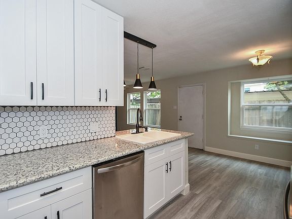 and this view looks towards the breakfast area and den