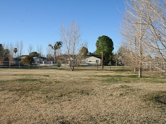 Back view w/barn and tack shed