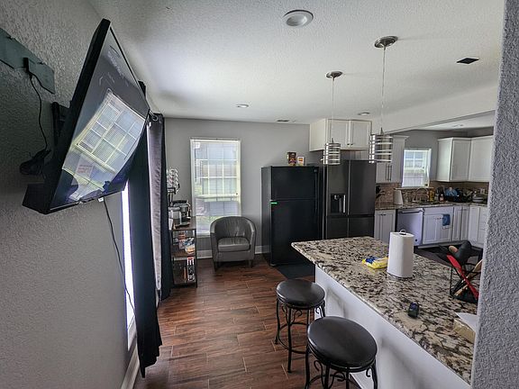 Full Kitchen with TV & Cooking Utensils