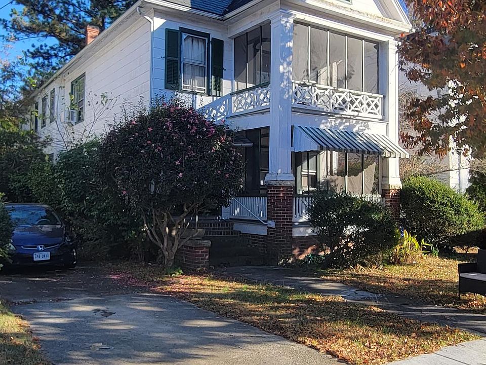 Vintage duplex on quiet residential street.