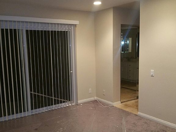 partial view of master br with entrance to balcony