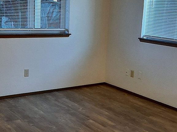 Living room is adjoining the eating area and kitchen occupying one big room.