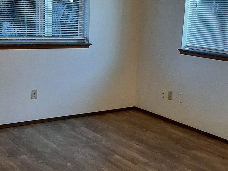 Living room is adjoining the eating area and kitchen occupying one big room.