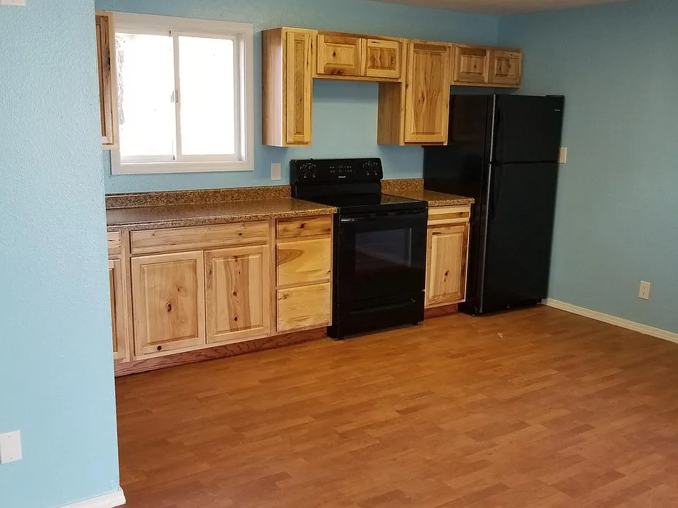 New fridge, stove cabinetry, countertops