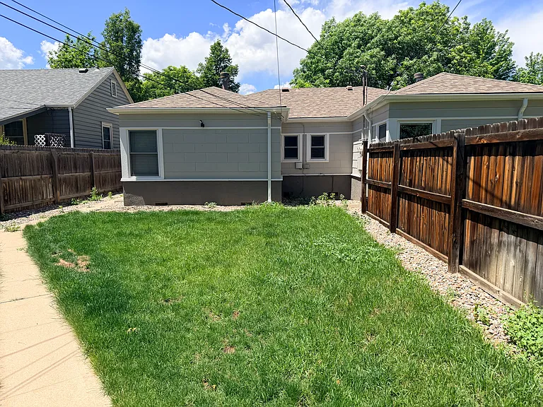 Private, fenced backyard perfect for children or pets. Weekly lawn mowing provided by landlord.
