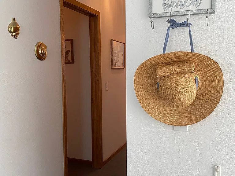 Galvanized BEACH Hooks at top of staircase