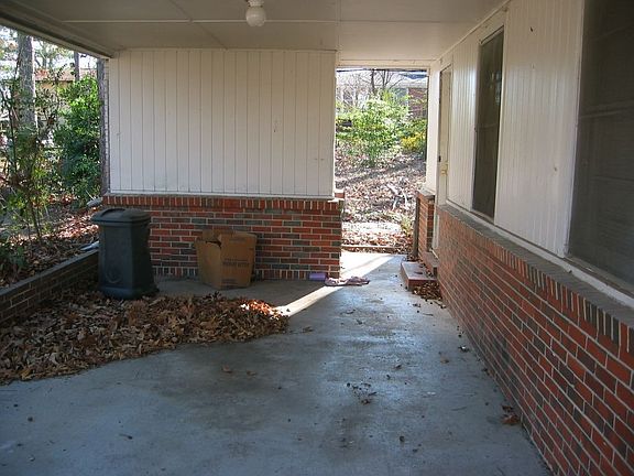 1-car carport with storage room for washer/dryer