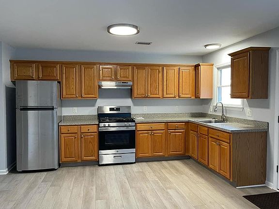 ample cabinetry and new stainless steel appliances