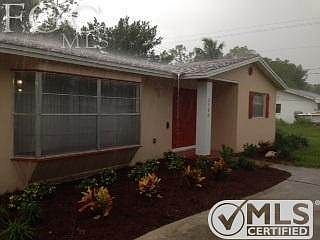 Newly Landscaped and completely Painted also.  Beautiful double front doors make grand entrance.  Check out the Bay Window!!