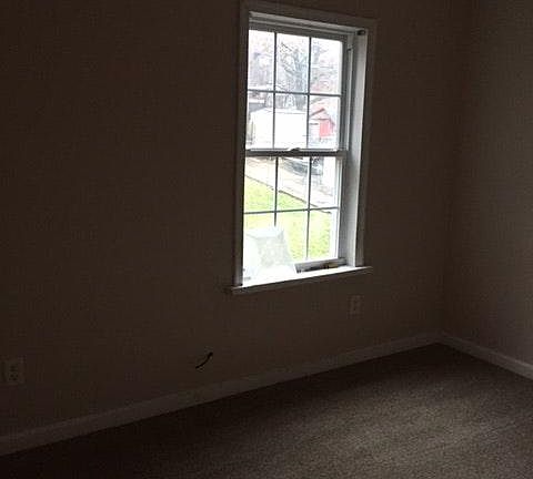 bedroom with new carpet