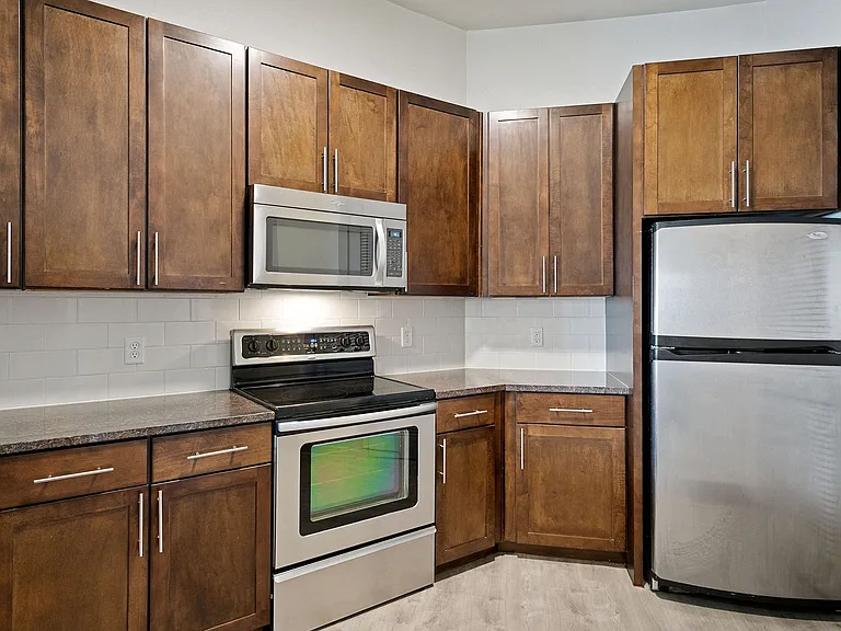 Custom cabinetry and stainless steel appliances