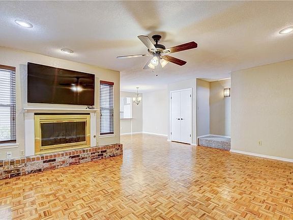 Same space once the owners moved out!  The outdoor courtyard is just behind the fireplace.