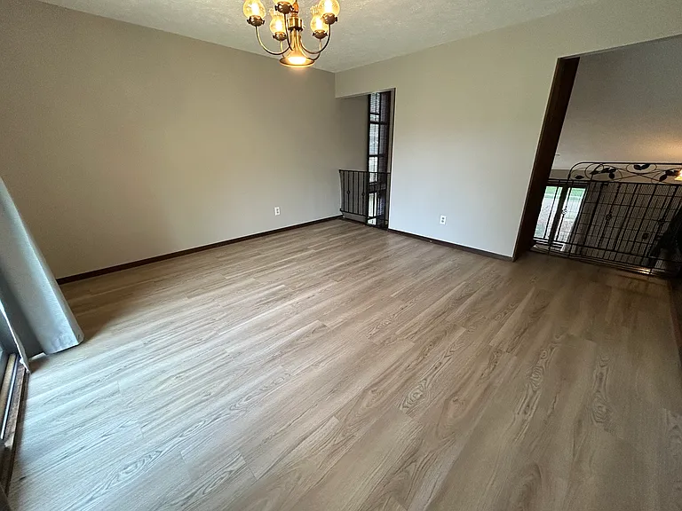 Dining Room with new luxury vinyl floor.
