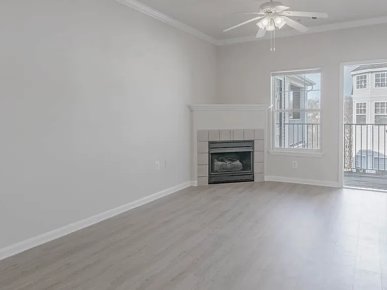 Living Room with Fireplace and Hard Surface Flooring