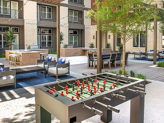 Enjoy a night on our terrace with friends grilling out and playing a game of Foosball