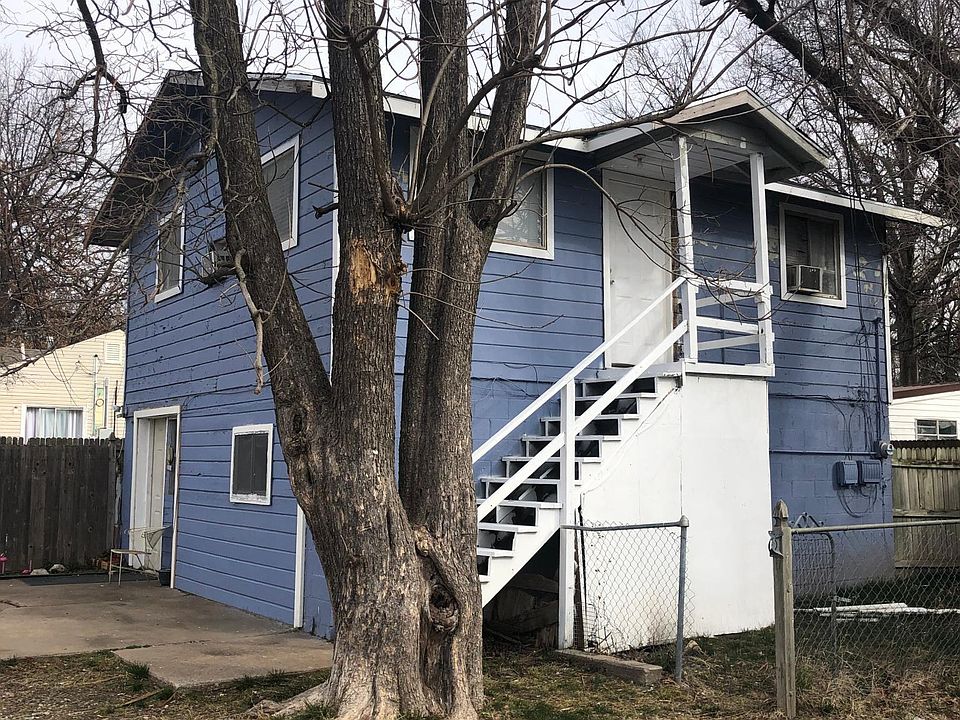 Upstairs unit with small fenced yard.