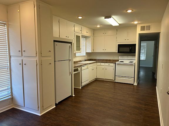 Kitchen overlooking backyard