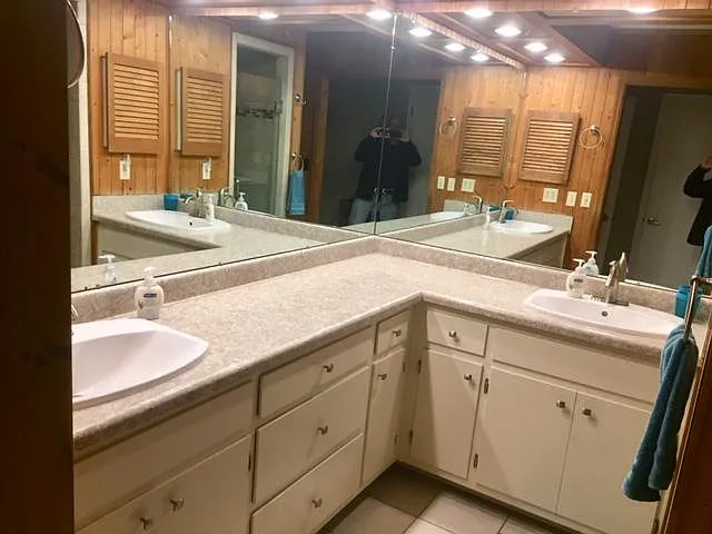Master bathroom with stall shower. Dual sinks and Medicine Cabinets