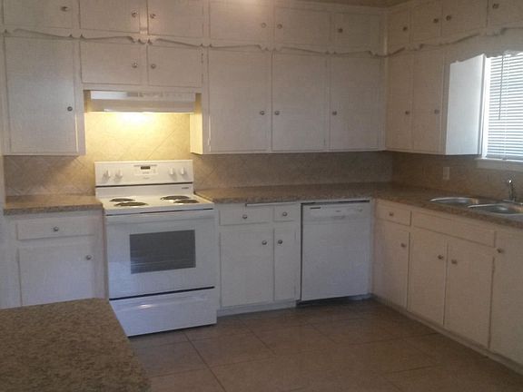 Kitchen is large with breakfast area