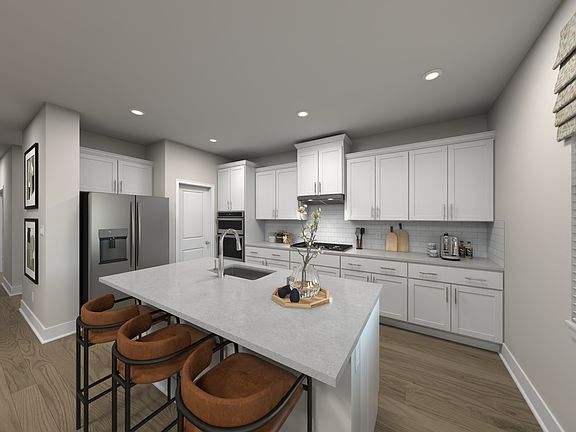 Kitchen in the Quinton floorplan at Meritage Homes.