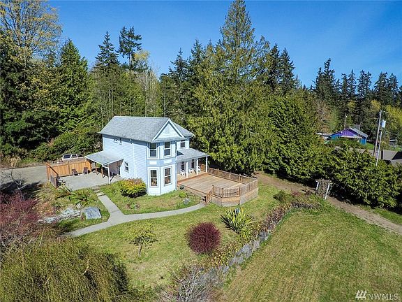 Property is more than 3/4 of an acre (0.83 ac). Grassy area to the lower right is part of the parcel.