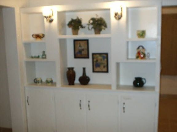 Tasteful decorations and window treatments are yours!!