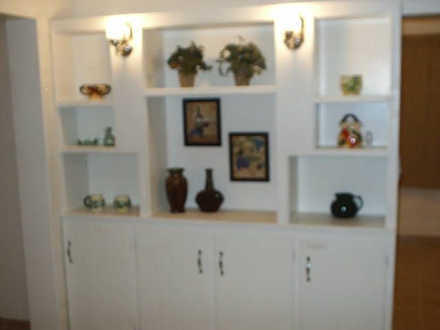 Tasteful decorations and window treatments are yours!!