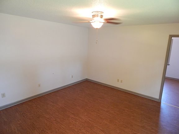 View of living room from the kitchen and hallway. There is a bedroom to the right. When entering the apartment, you enter the living room. The entry door is to the right in the picture.