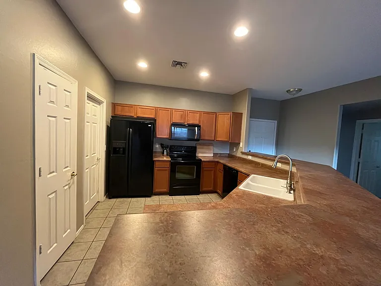 Kitchen - doors on the left are pantry and laundry room