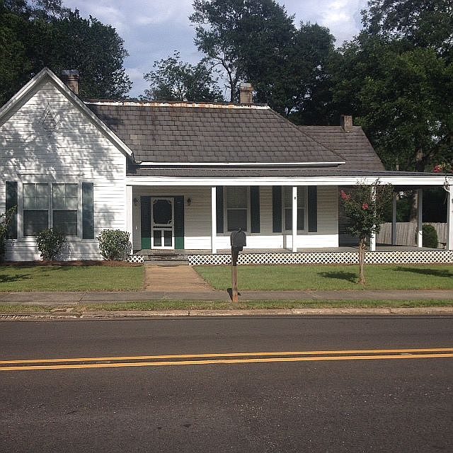Front with L shaped porch