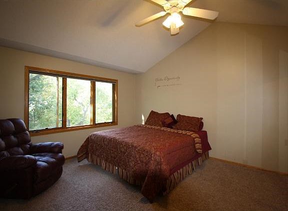 Spacious Master Bedroom with Cathedral Ceiling.